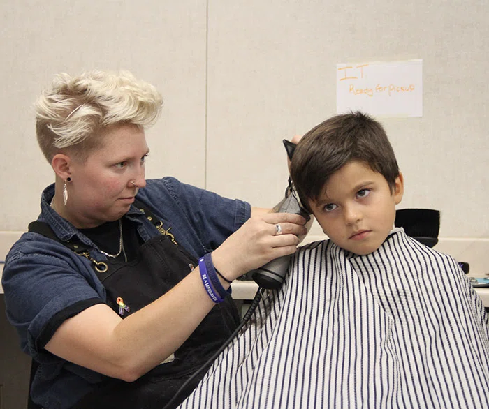 Students received free haircuts.