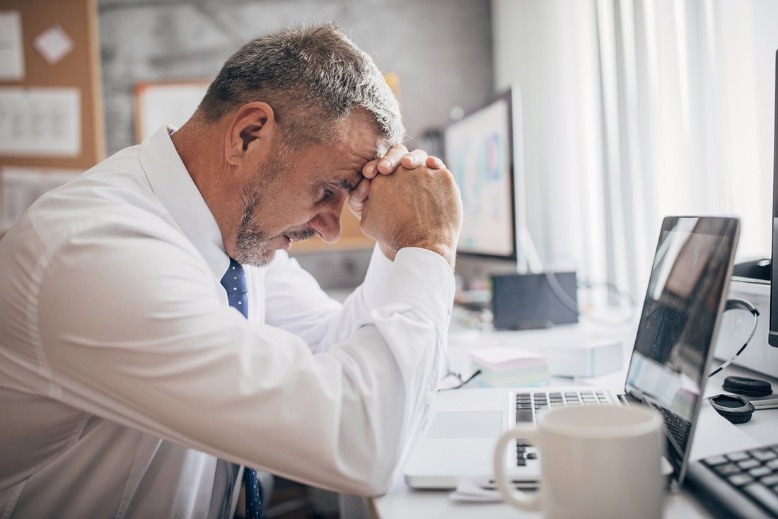 Man_stressed_at_desk.jpg