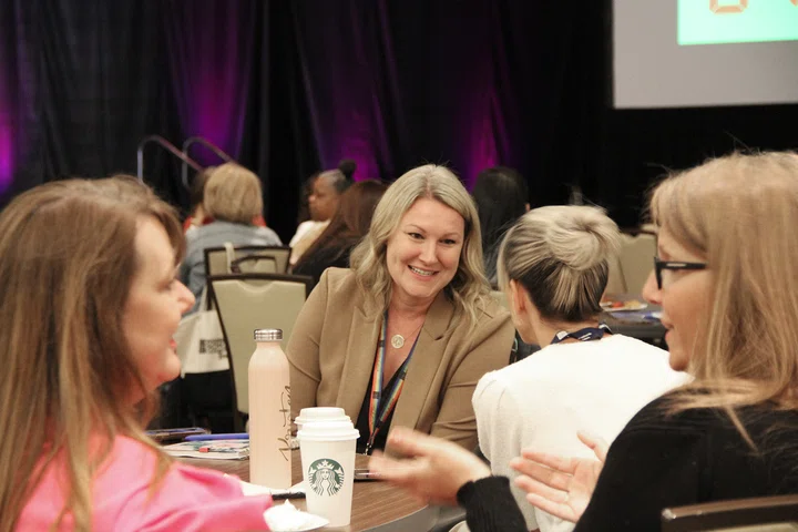 Miriam Worth shares stories with a partner during Irene Salter’s keynote.