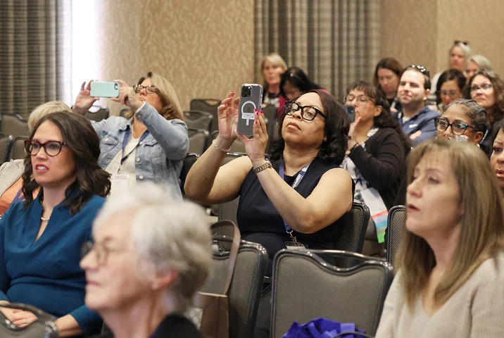 Attendees pop open their cell phones during ACSA’s session on administrator rights.