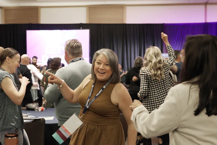 Attendees practice self-expression by dancing during Marlon Styles’ keynote address.