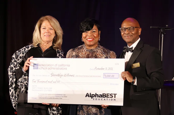 Judy Nee, CEO of AlphaBEST Education, Shandelyn Williams and Daryl Camp.