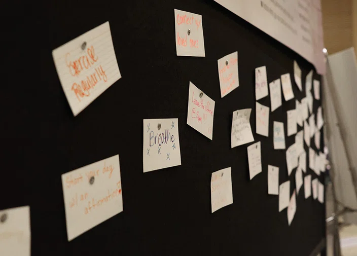 At ACSA’s Member Services booth, attendees wrote mental health tips on a bulletin board.