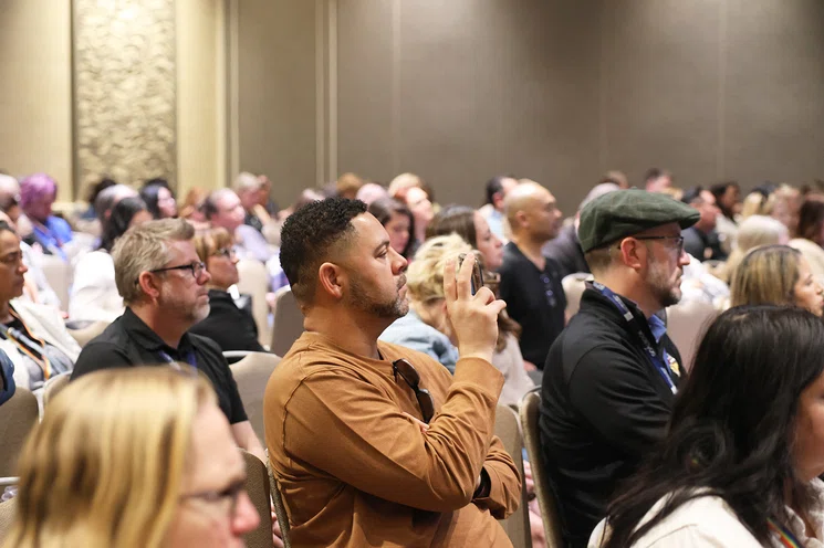 Attendees in a session on AI.