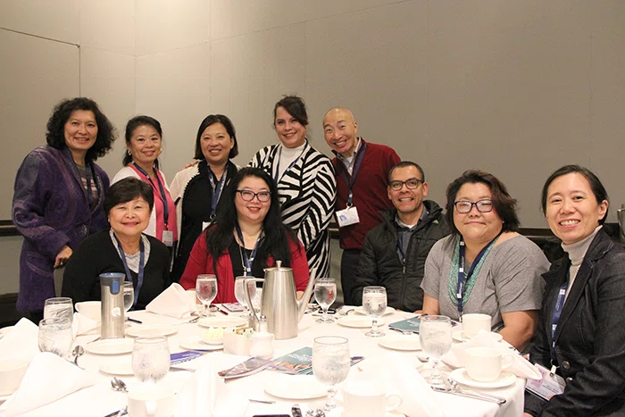Attendees pose before the ESS Luncheon.