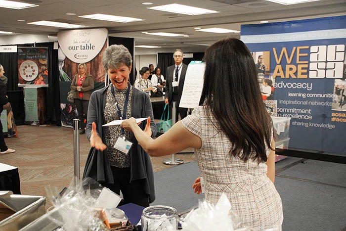 Kathy Granger from Region 18 wins the grand prize raffle drawing.