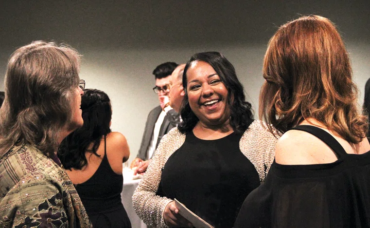 Middle Grades Principal of the Year Shana Henry chats during a reception prior to the Awards Dinner.