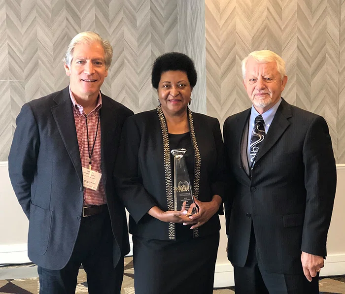 NASS Superintendent of the Year Nettie Collins-Hart with Jonathan Raymond and Sonny DaMarto.