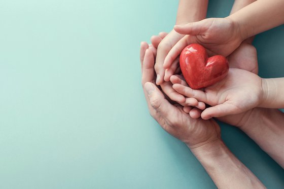 Hands_holding_heart.jpg