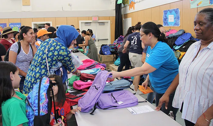 Students received free backpacks with school supplies.