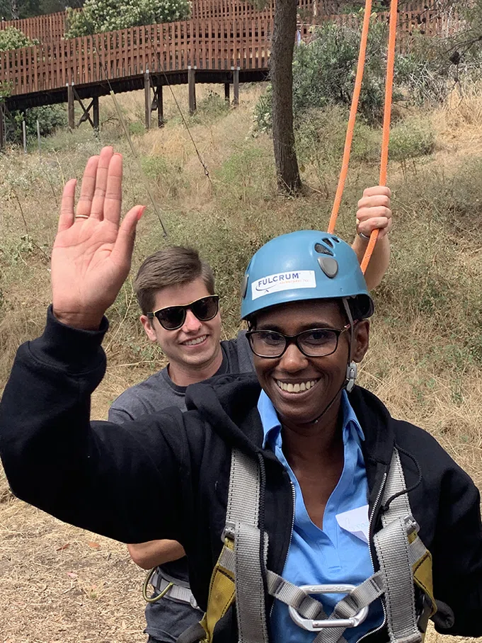 Principal Grozelia Ward at the ropes course.