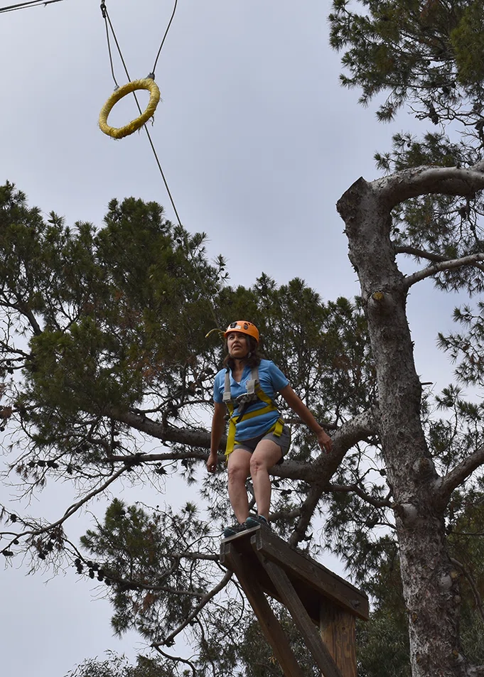 Principal on the ropes course.