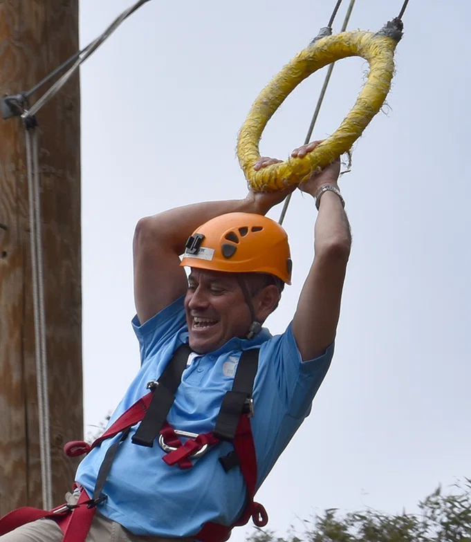 Principal on the ropes course.