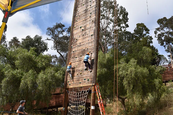 Principal on the ropes course.