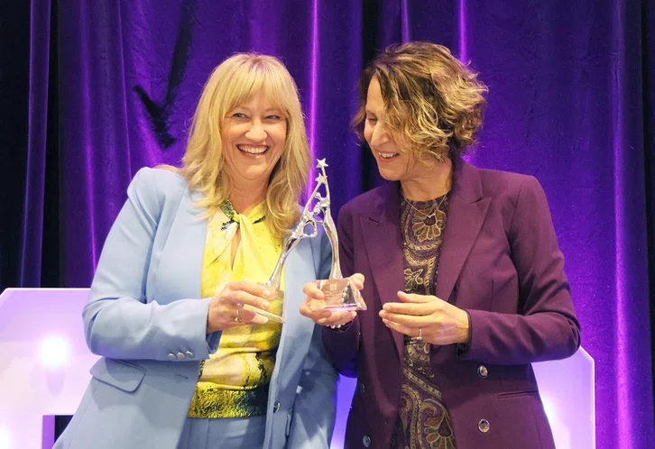 Cali Binks and Parvin Ahmadi celebrate winning ACSA’s 2025-26 Exemplary Women in Education Award.