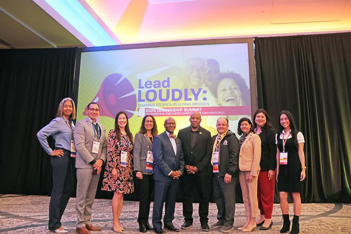 The planning committee for the 2025 Leadership Summit with keynote speaker Dr. Calvin Mackie.