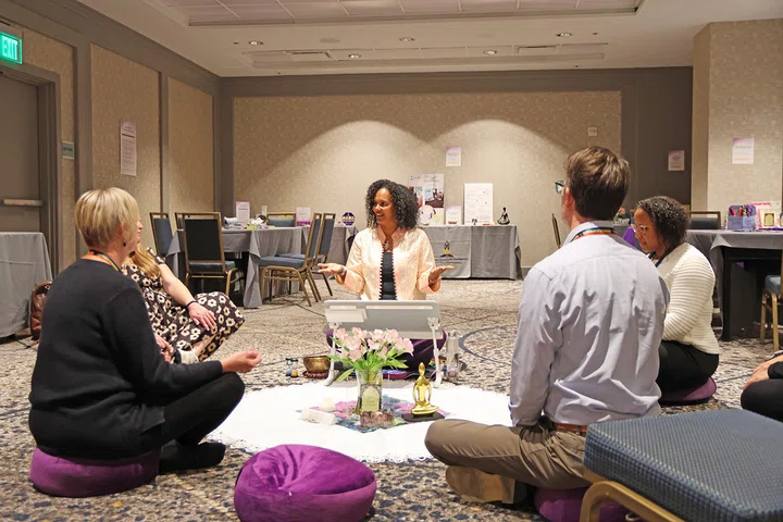 Tovi C. Scruggs leads a meditation session in The R.E.S.T.’d Leader Lounge.