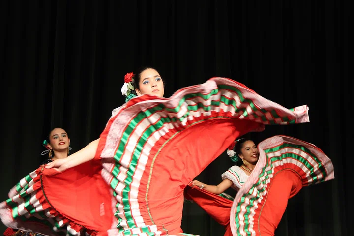 Student dancers perform before a general session.