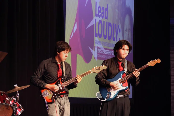The Lowell High School Band provide opening session music.