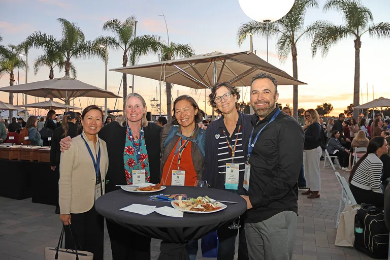 Team from Fremont USD attends the Monday evening reception.