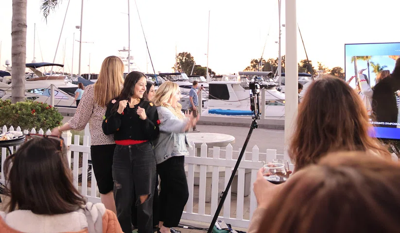 Attendees do the 360 photo booth.