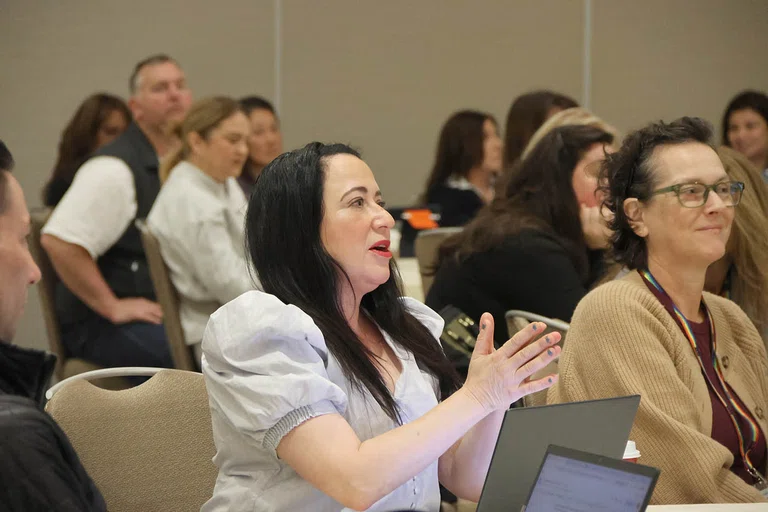 Attendees provide perspectives during a session.