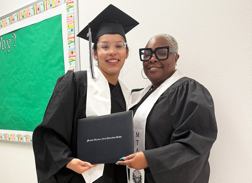 AOY_Donahue_with_a_Graduate_who_finished_in_th.jpg