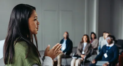 Woman_Leading_Seminar.jpeg