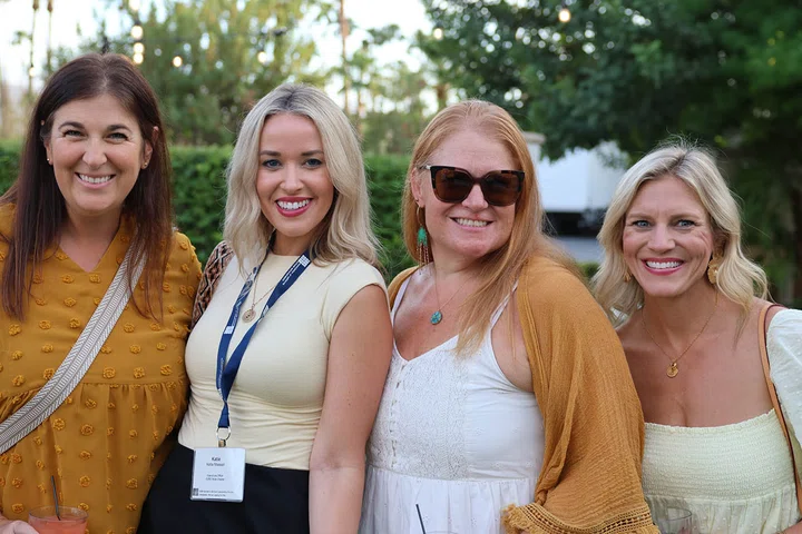 A splash of yellow and plenty of smiles at the outdoor dinner reception.