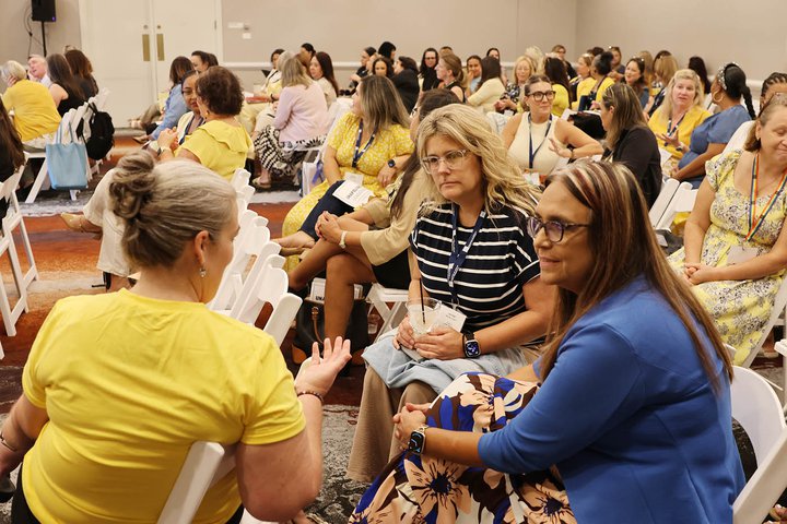 Attendees exchange ideas and perspectives during a breakout session.