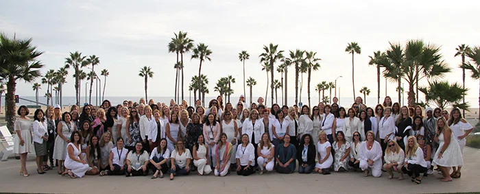Attendees wear white at the Unity Reception during the Women in School Leadership Forum.
