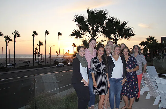 Attendees enjoy the sunset following the welcome reception.