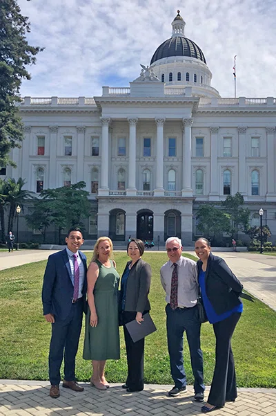 ACSA Ed Options Council members pose in front of the state Capitol.